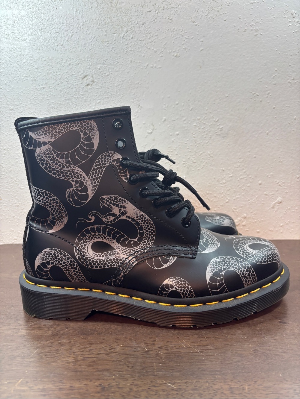 Dr. Martens Black Lace-Up Boots with White Snake Print and Yellow Stitching - Picture 1 of 8